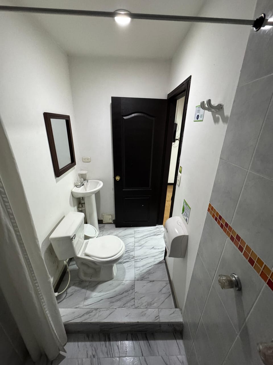 Shower, towels, soap, toilet paper