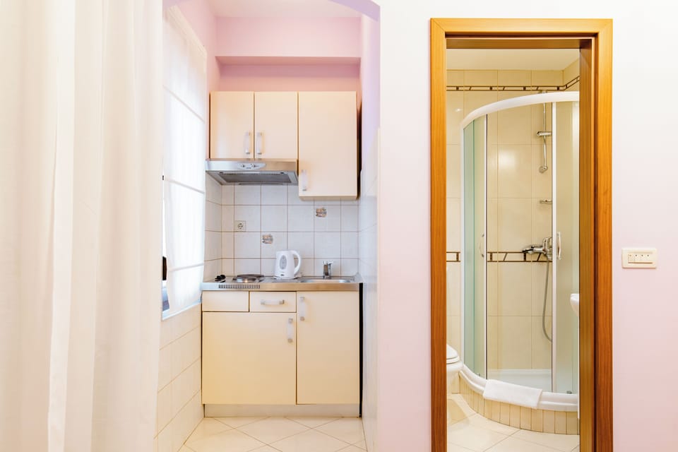 Standard Double Room, City View | Bathroom | Shower, hair dryer, towels, soap