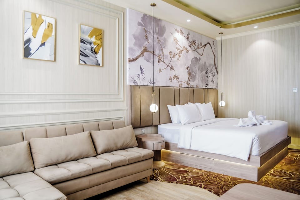 City Suite, City View | Living area | 40-inch Smart TV with digital channels