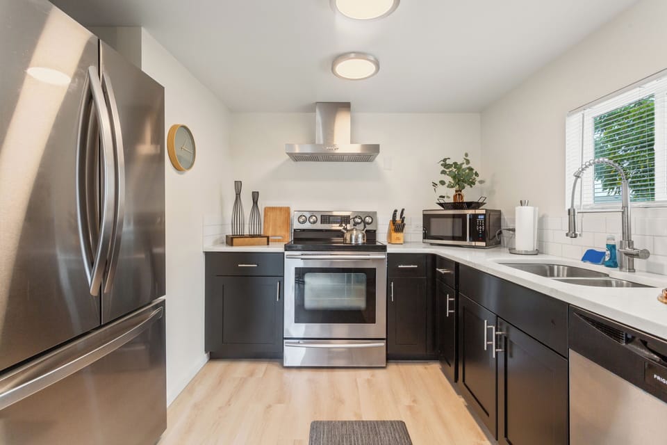 Complete kitchen with range, dishwasher, microwave, and of course coffee.