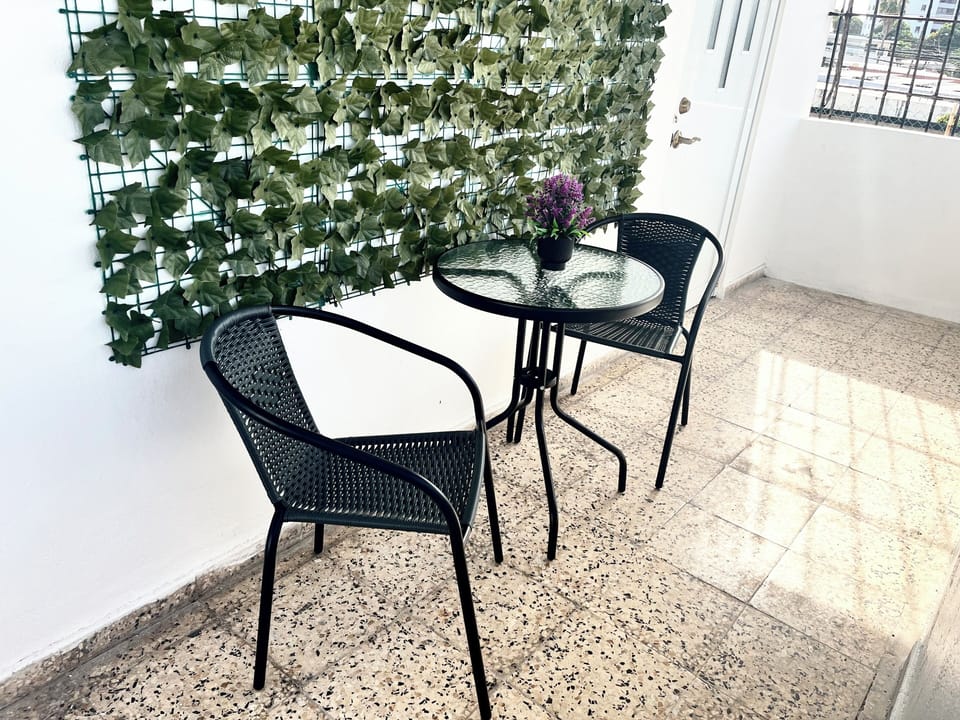 Light and airy balcony for you to enjoy your morning coffee.