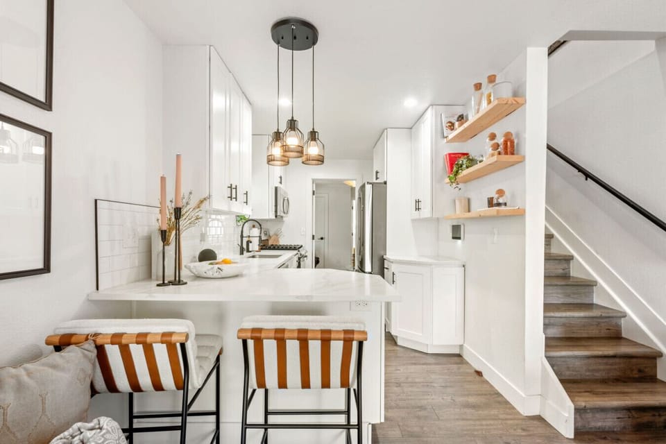 Fully stocked kitchen with bar seating