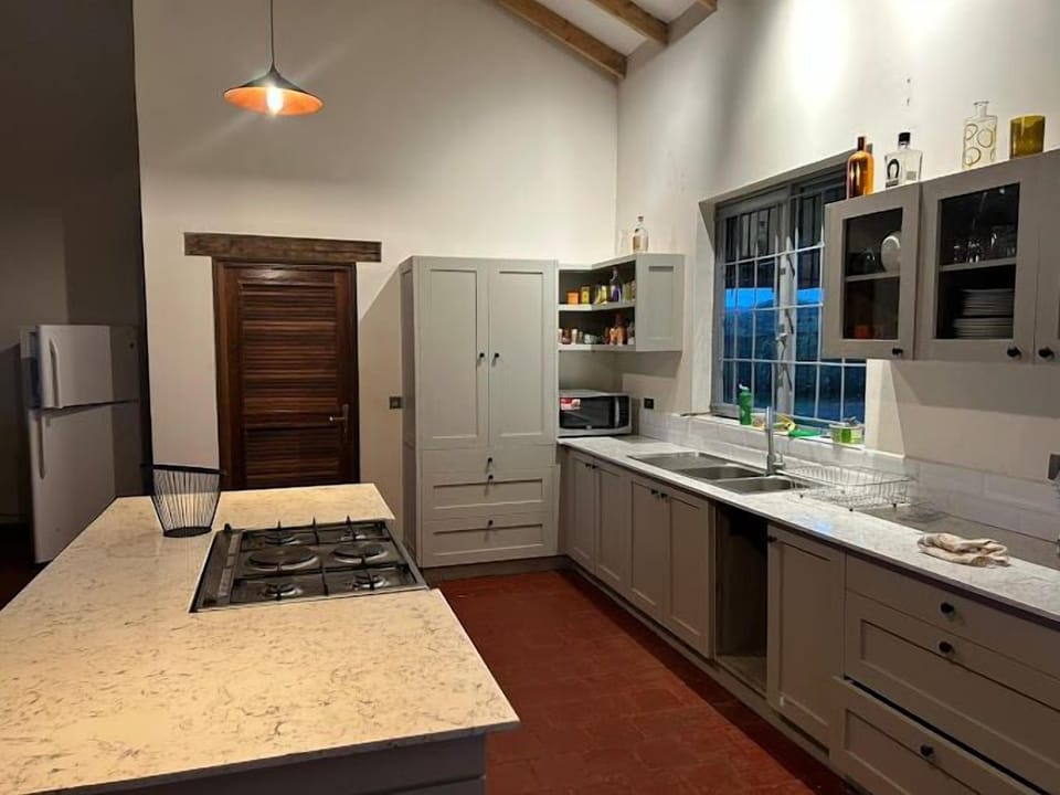 Family Apartment, Pool View | Private kitchen | Fridge, microwave, cookware/dishes/utensils