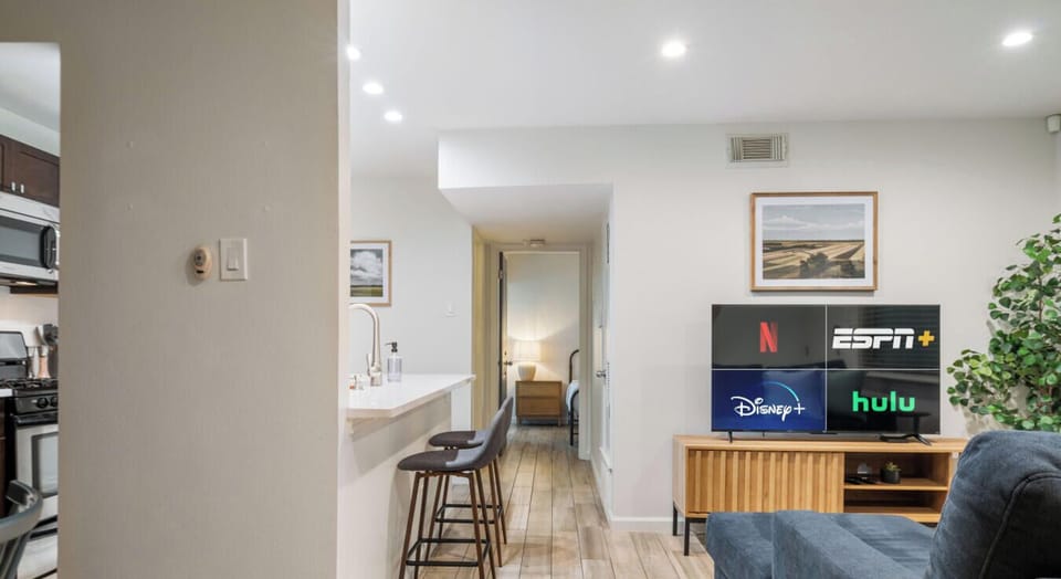 Netflix to Hulu on tap; relax here before the hallway leads you to a peaceful night’s sleep.