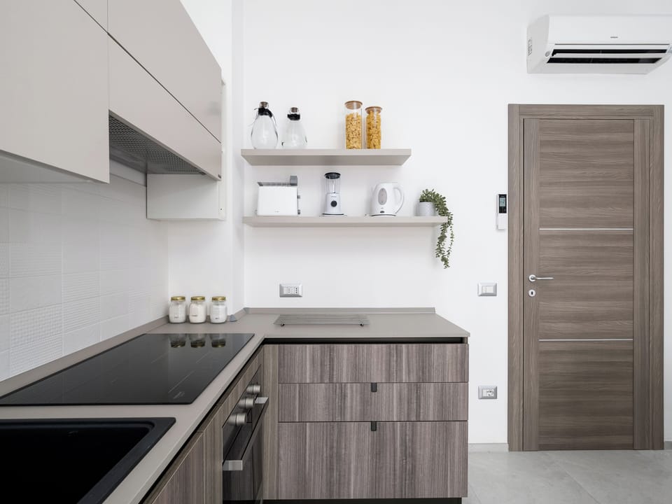 Comfort Apartment, Balcony, City View | Private kitchen | Full-size fridge, microwave, stovetop, espresso maker