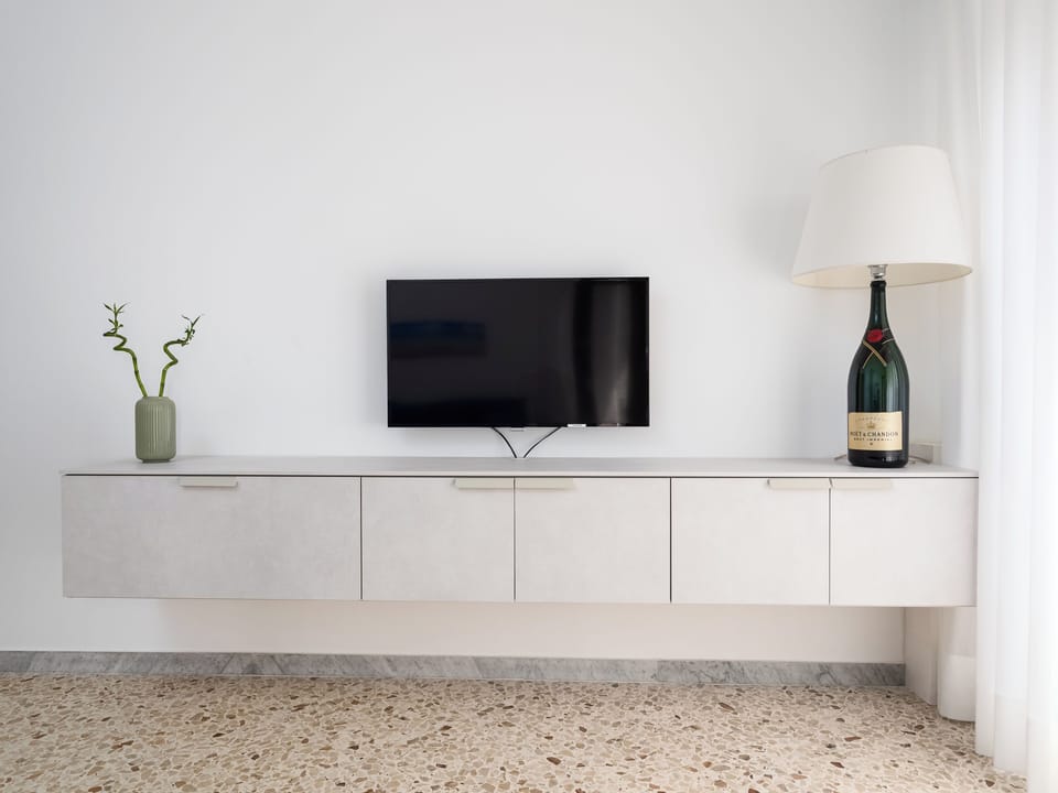 Comfort Apartment, Balcony, City View | Living area | 46-inch Smart TV with digital channels