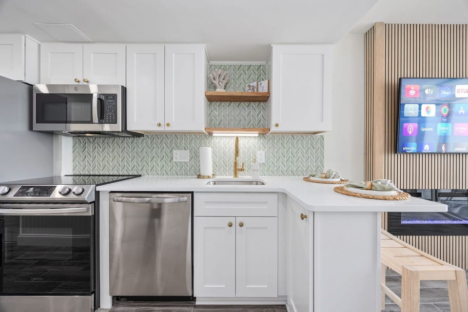 Enjoy a fully equipped kitchen featuring high-end appliances.