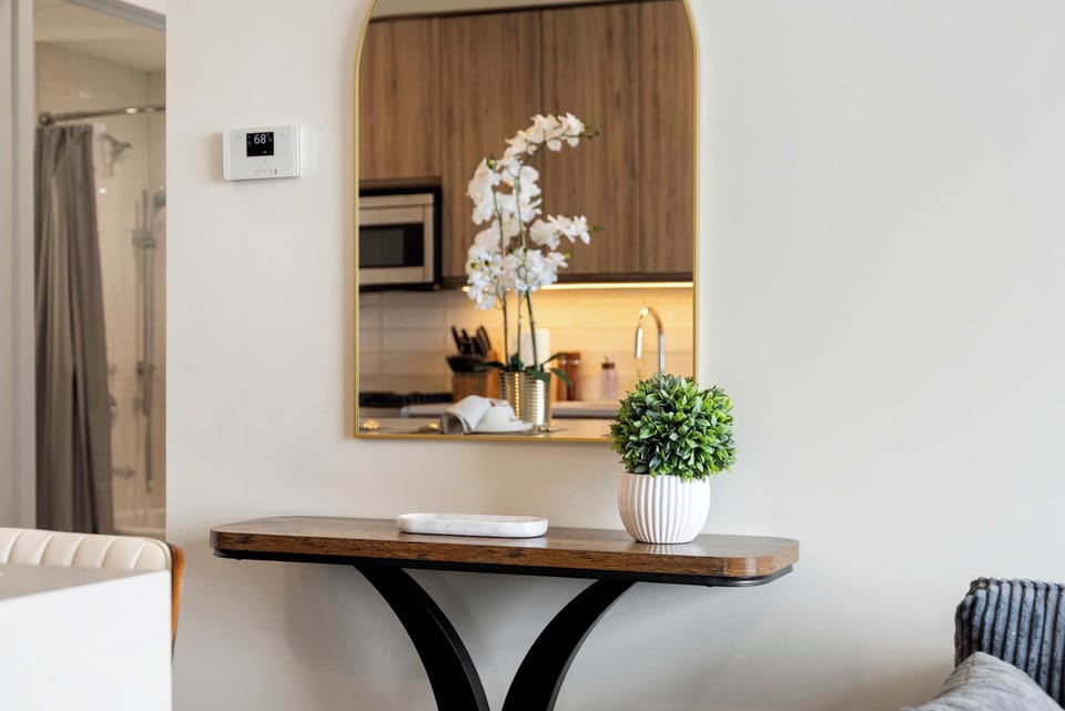 Bright entryway w/ clean lines, natural light, & a welcoming first impression.