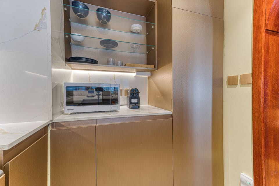 Luxury Apartment, Balcony, Sea View | Private kitchen | Full-size fridge, microwave, oven, stovetop