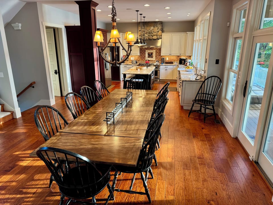 Centrally located between the kitchen and great room, perfect for shared meals and conversation