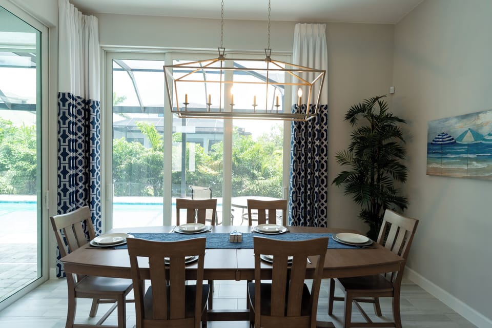 Indoor dining area, overlooking private pool.