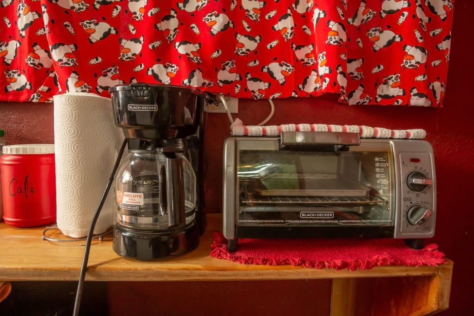 Mini-fridge, microwave, cookware/dishes/utensils
