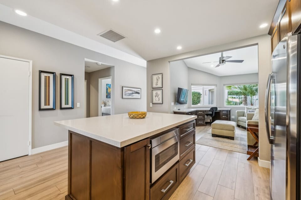 Beautifully appointed kitchen with a large island, offering the perfect blend of style, space, and functionality.
