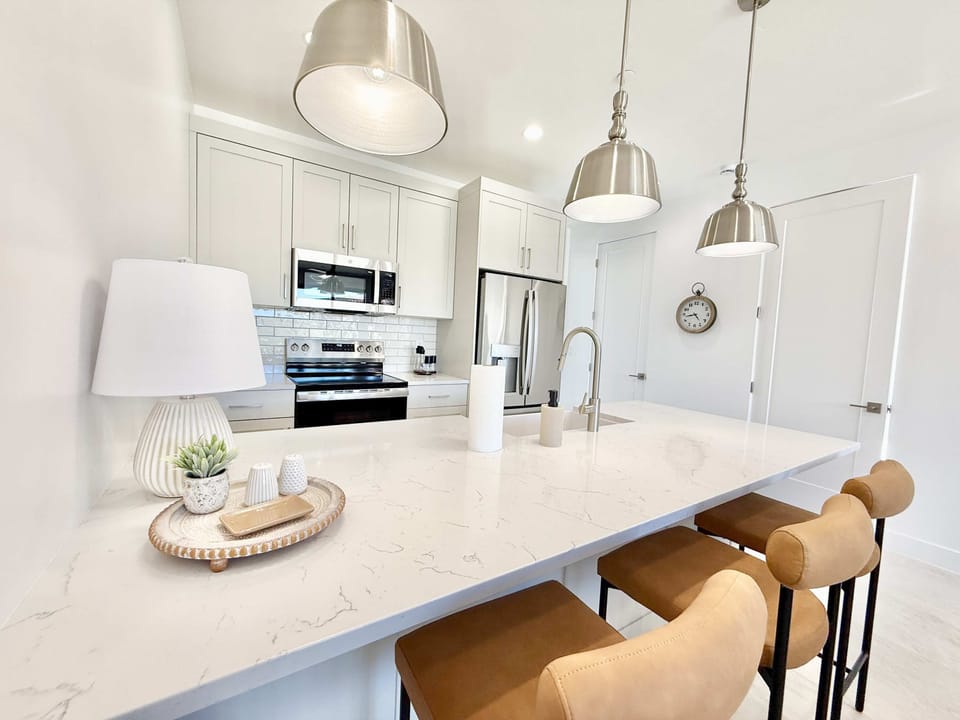 Stocked with modern essentials, this kitchen makes staying in easy and delicious