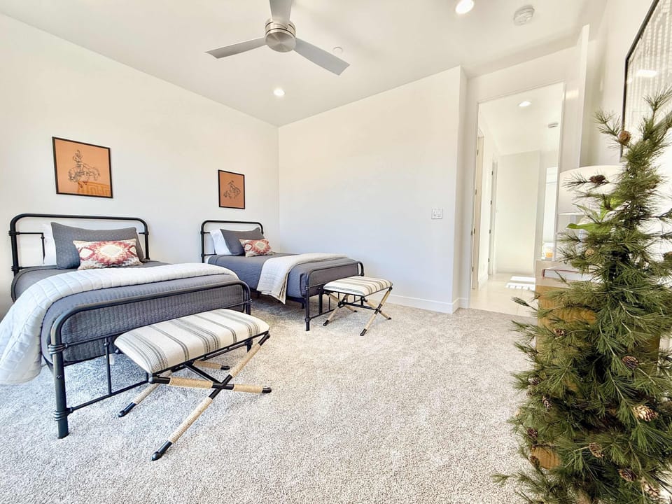 Bedroom 3 offers two twin beds and is located right next to the full bathroom