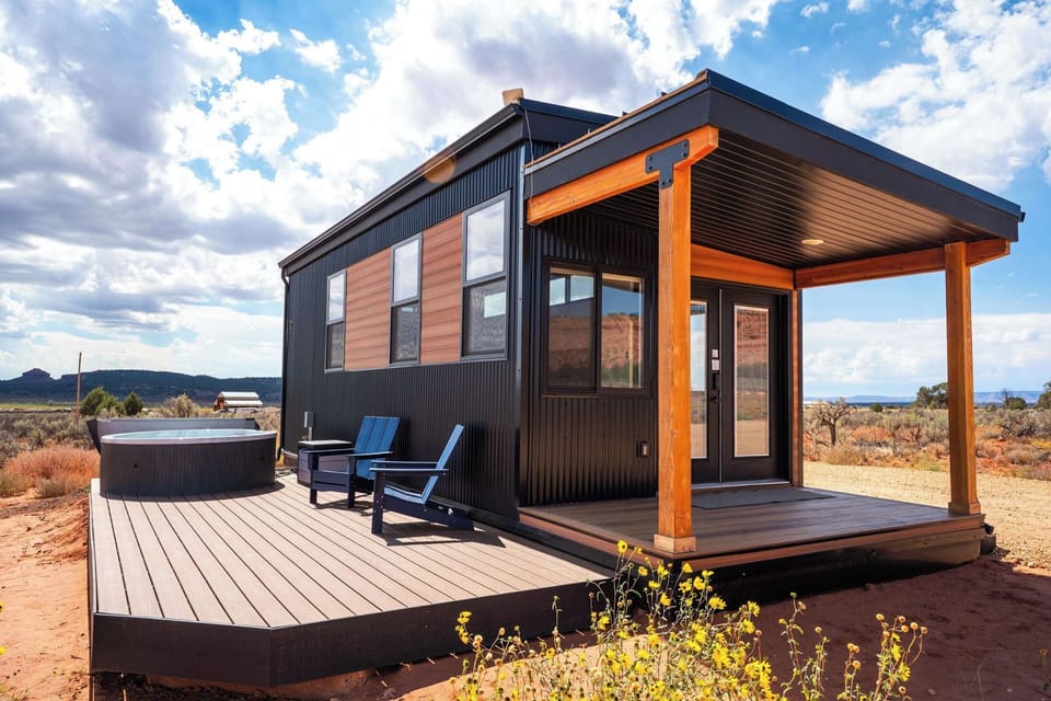 Soak in the private hot tub on the deck at Journey Pines, surrounded by Kanab's stunning red desert scenery.