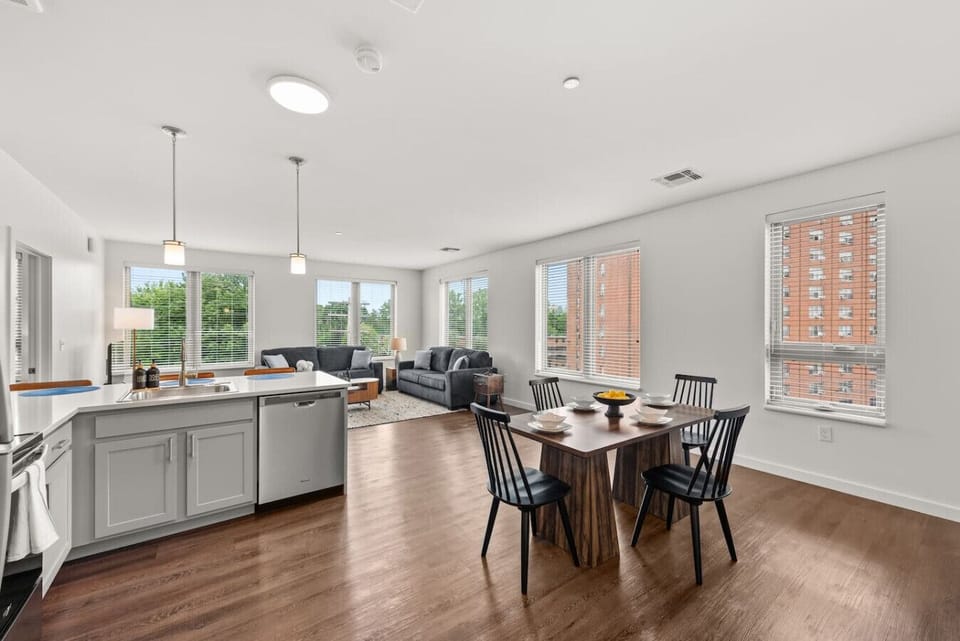 Open-concept dining area beside the kitchen and living room