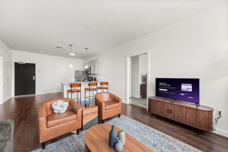 Open living and dining area with Smart TV