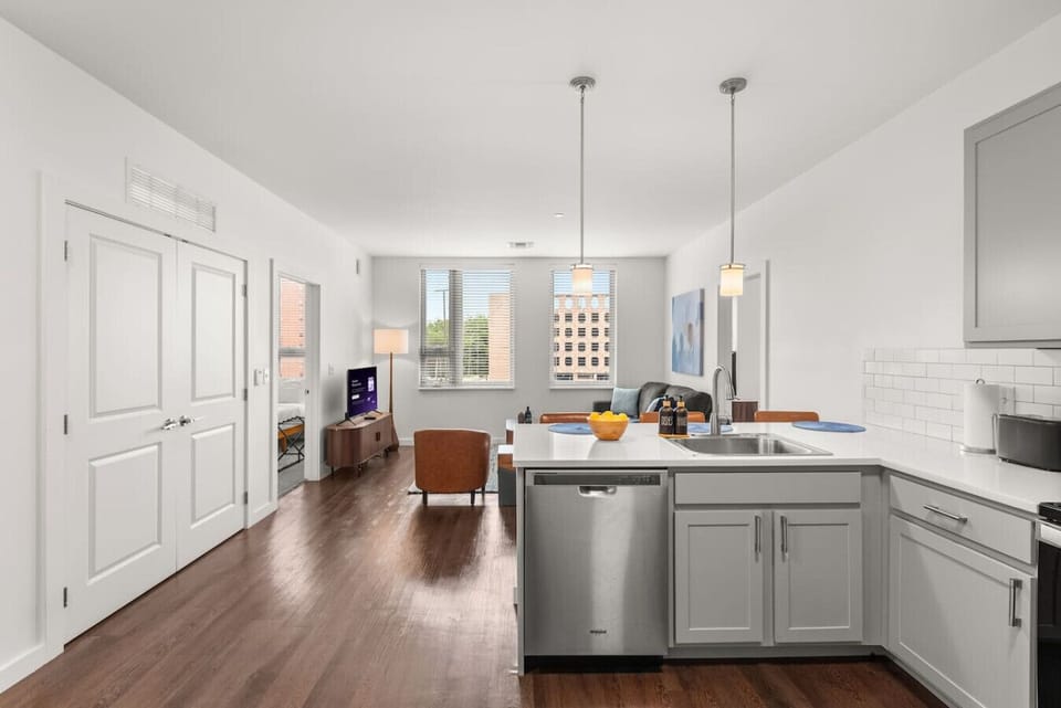 Open-concept kitchen and living area with modern finishes