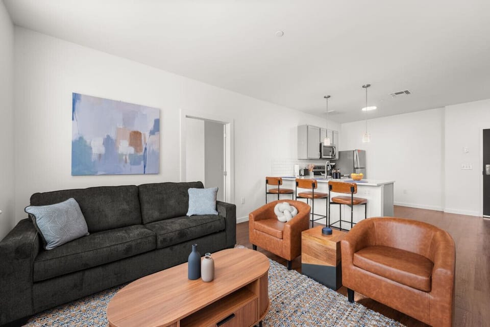 Comfortable living room with kitchen and dining area