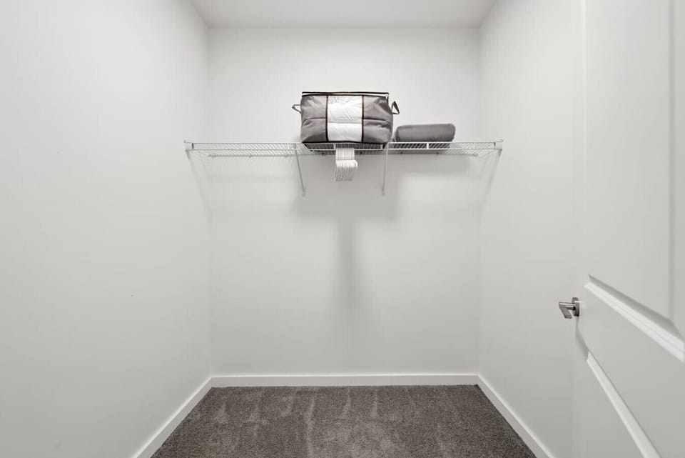 Spacious closet with storage and hangers