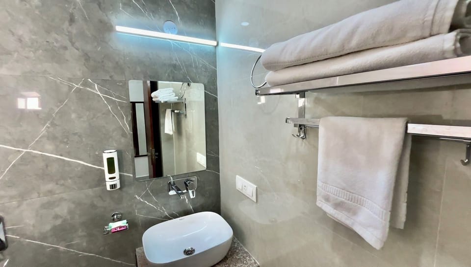 Shower, free toiletries, towels, soap