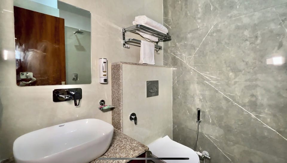Shower, free toiletries, towels, soap