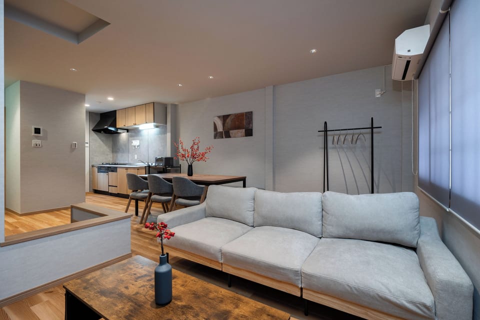 Luxury House, Balcony | Living area | 50-inch flat-screen TV with cable channels