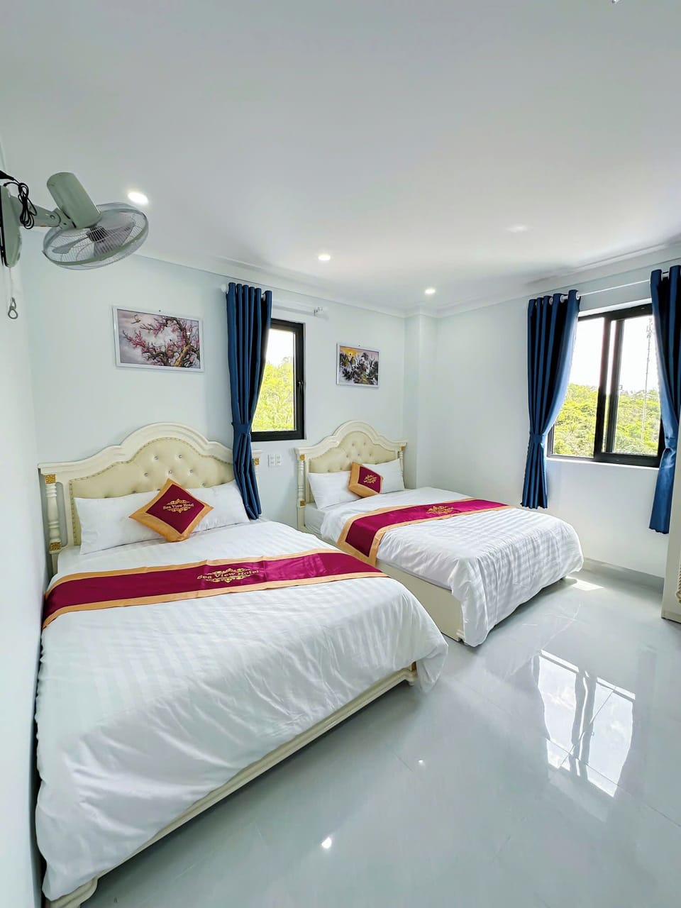 Deluxe Quadruple Room | Free WiFi, bed sheets