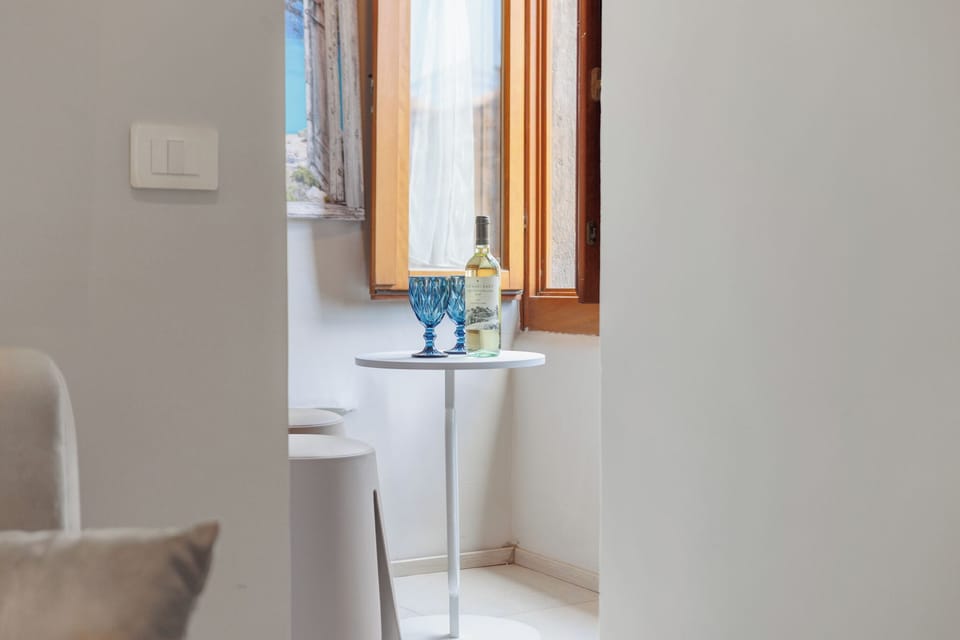 Luxury Triple Room, City View | Desk, laptop workspace, free WiFi