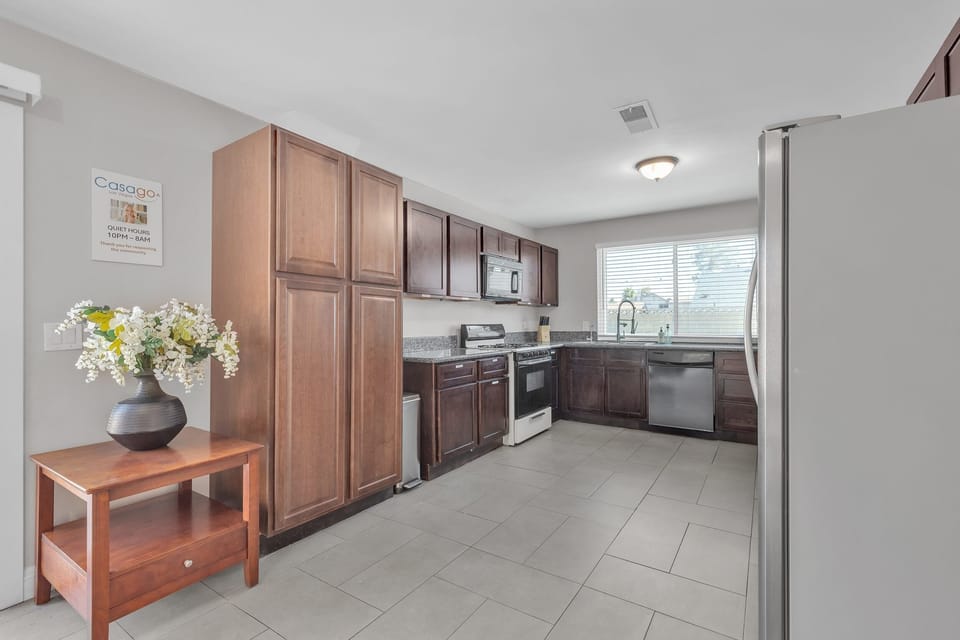 The kitchen is fully equipped with modern appliances and everything you need to cook at home.