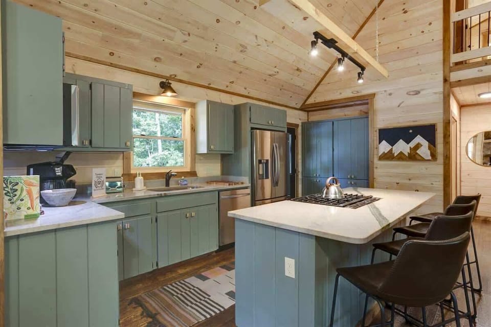 KITCHEN w/GAS COOKTOP ISLAND & 4 SLEEK LEATHER BAR STOOLS