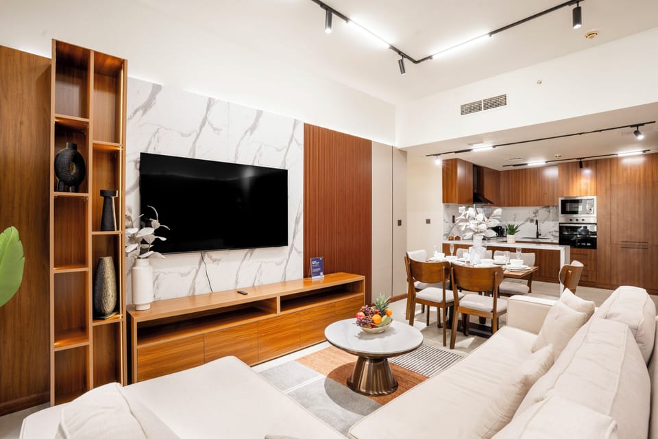 Luxury Apartment, 2 Bedrooms, Non Smoking, Sea View | Living area | 55-inch Smart TV with cable channels