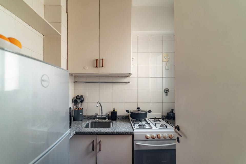 Standard Apartment | Private kitchen | Full-size fridge, microwave, oven, stovetop