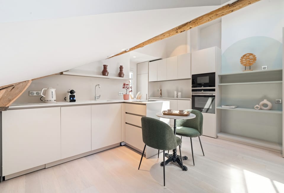 Deluxe Apartment, Courtyard View | Private kitchen | Espresso maker, electric kettle, toaster, freezer
