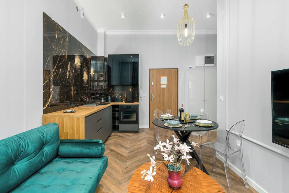 View from the window showing the functional combination of kitchenette and living room.