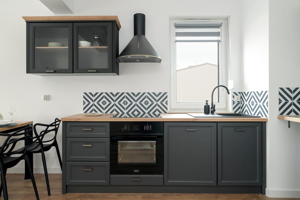 The fully equipped kitchenette includes everything you need for a home-cooked meal.