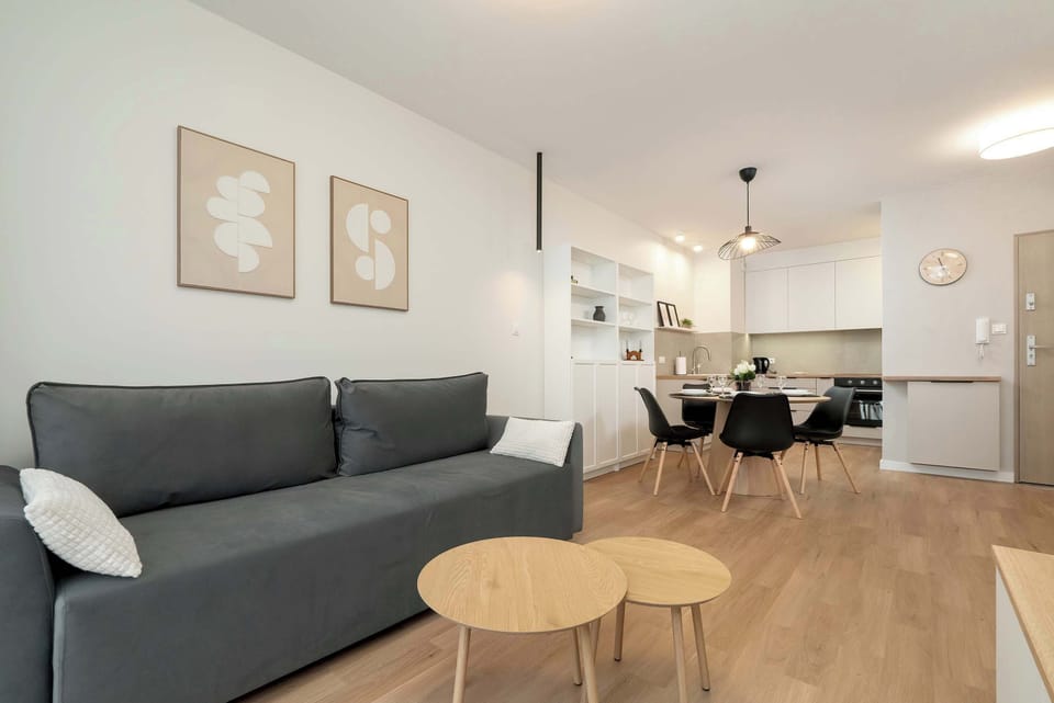 Living room with a comfortable sofa and TV. 