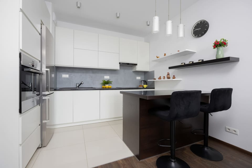 Open-plan living space combining the kitchenette and dining area.