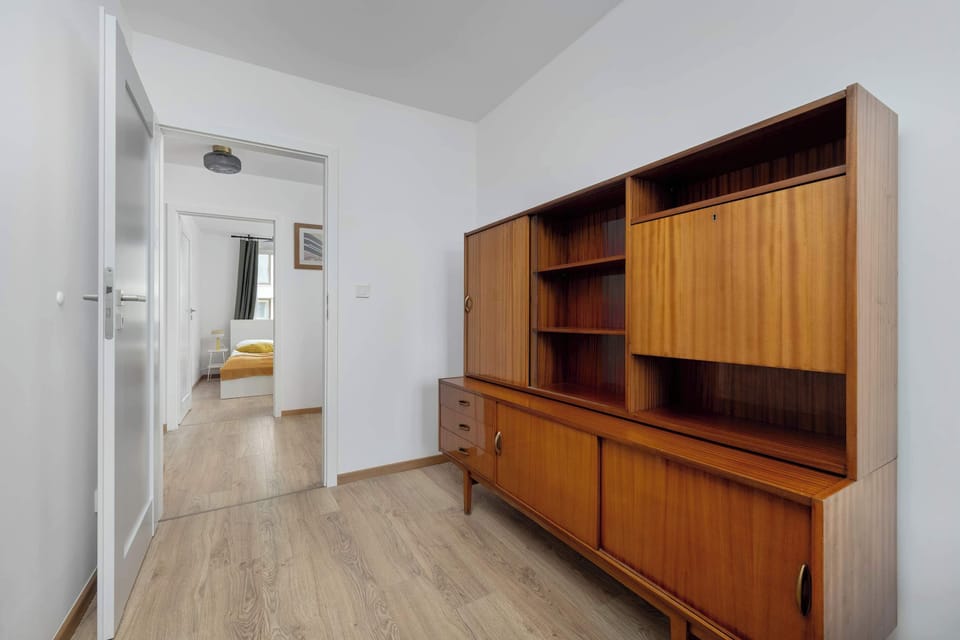 The bedrooms' contemporary decor creates a chic and cozy atmosphere.