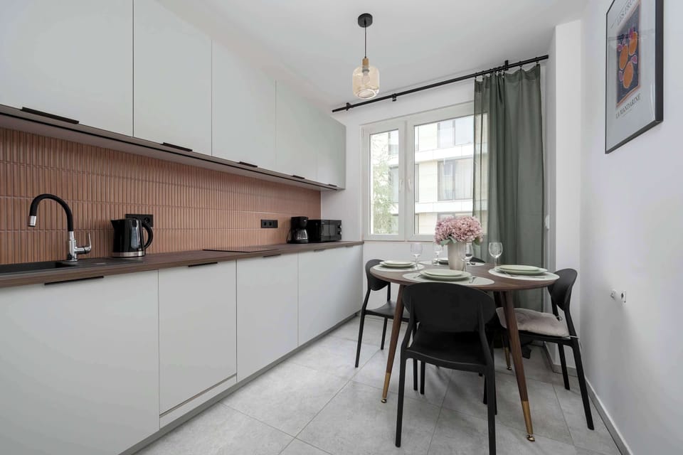 The kitchen offers a functional layout for convenient cooking.