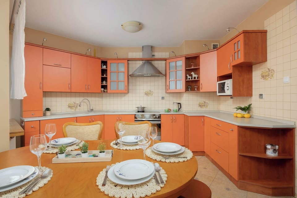 Fully equipped kitchenette with dining area.