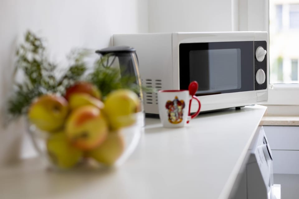 Microwave in the fully equipped kitchen.
