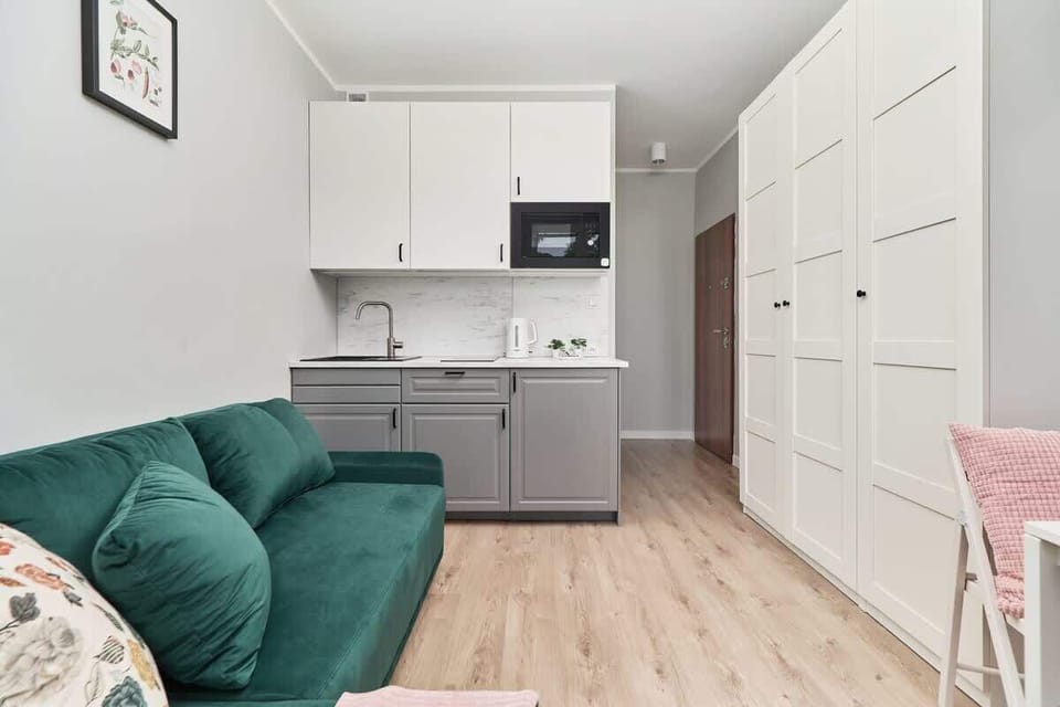 Fully equipped kitchenette with modern appliances.