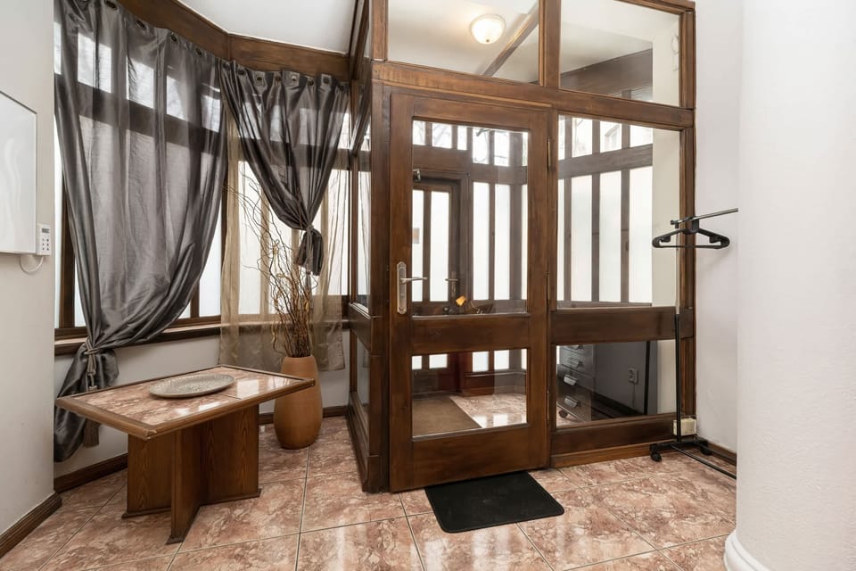 The living area offers a bright and airy space for relaxation.