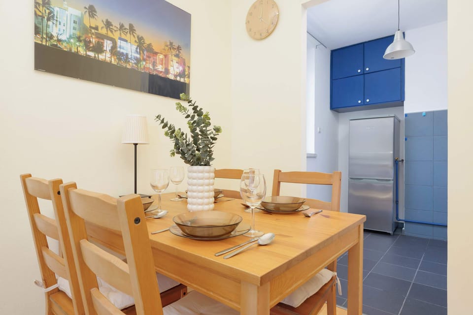 Dining area and fully equipped kitchenette.