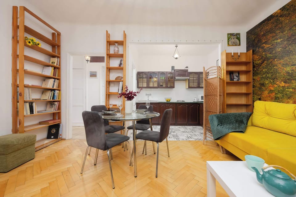 The living room has a comfortable space designed for remote working.
