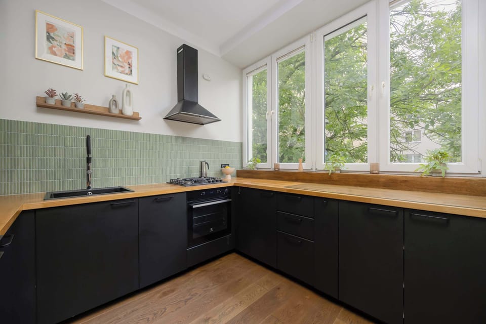 The fully equipped kitchenette includes everything you need for a home-cooked meal.
