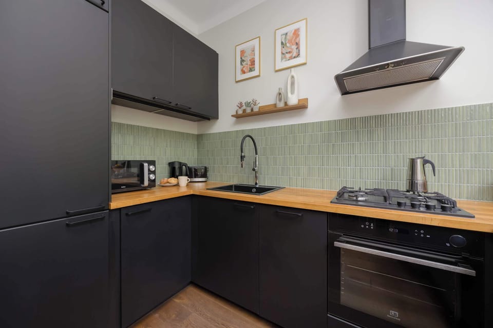 The kitchenette's practical layout maximizes space and functionality.