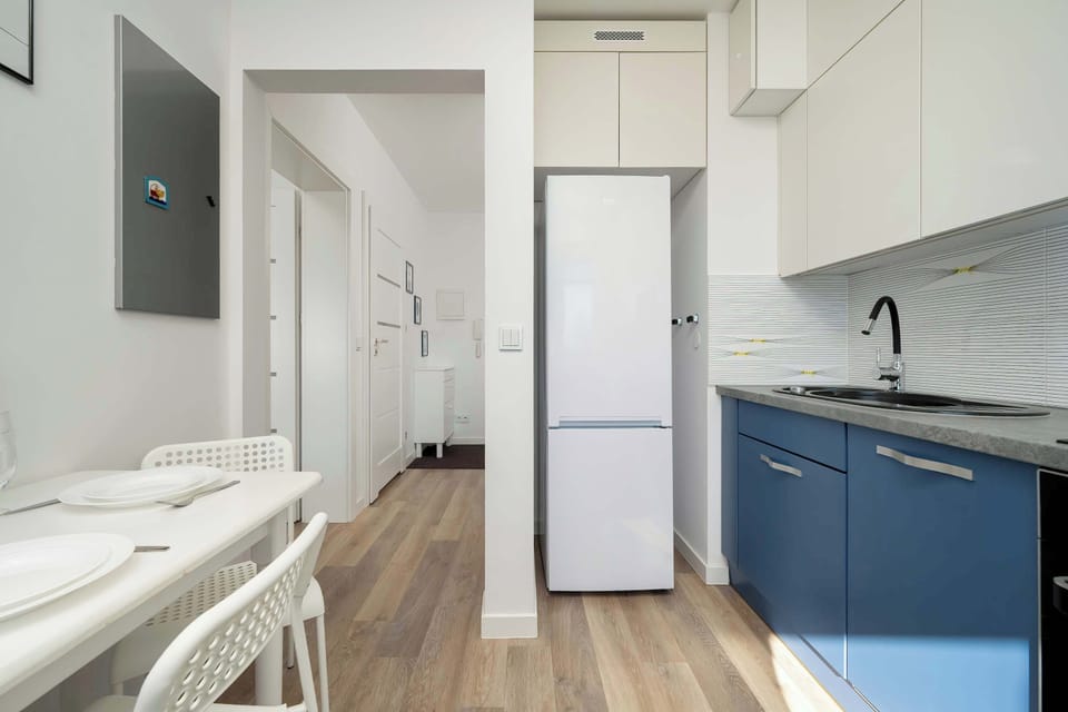 The functional kitchen provides space for preparing your favourite dishes to be enjoyed around the table.